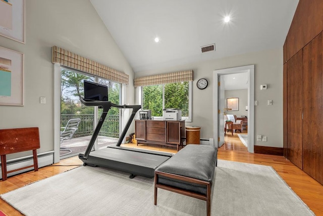 exercise room with visible vents, light wood-style flooring, high vaulted ceiling, and a baseboard radiator