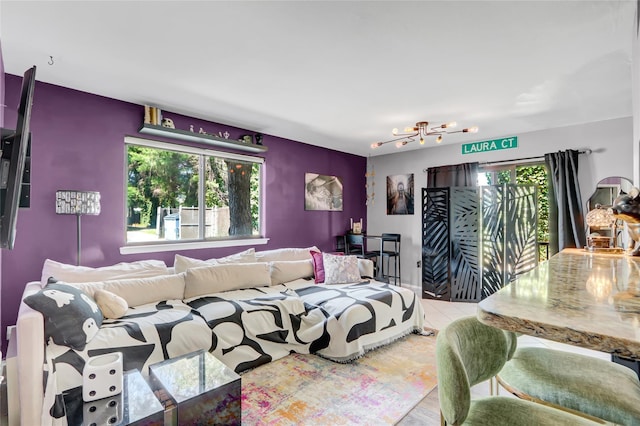 bedroom with multiple windows and access to exterior