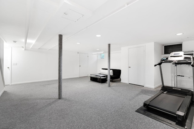 exercise room featuring carpet floors, recessed lighting, and baseboards