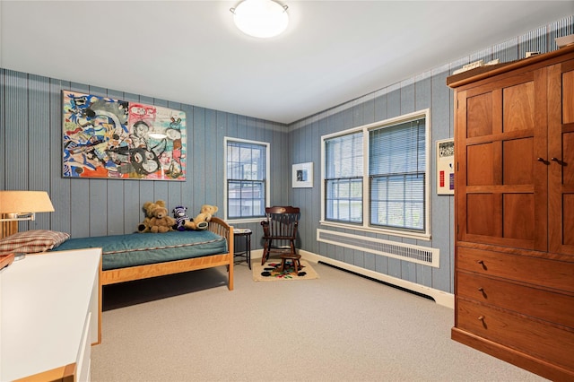 carpeted bedroom featuring radiator heating unit