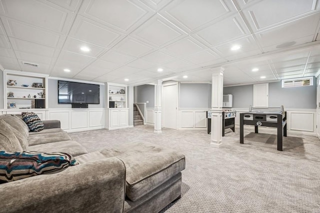 living area featuring recessed lighting, stairs, visible vents, and built in shelves