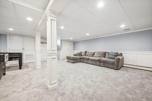 living room featuring recessed lighting, carpet flooring, and ornate columns