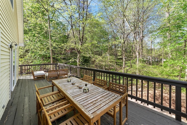 deck featuring outdoor dining area