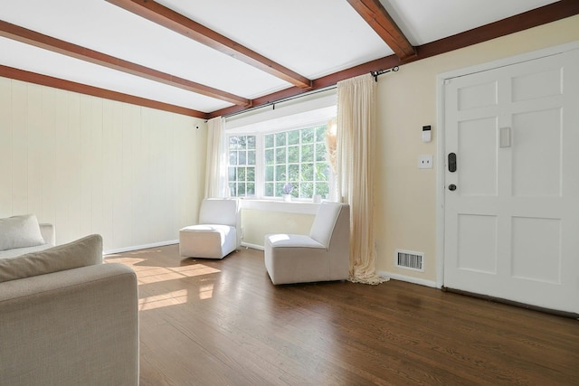 35 Harding St, Pearl River, NY 10965 - living room with dark wood-style flooring, beamed ceiling, visible vents, and baseboards