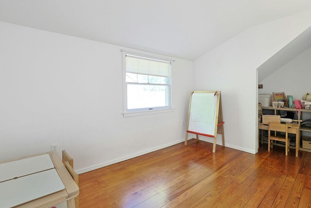 35 Harding St, Pearl River, NY 10965 - office area featuring baseboards, vaulted ceiling, and wood finished floors
