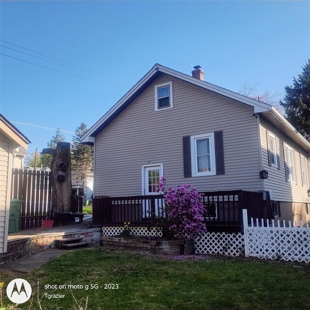 109 Lake Ave, Middletown, NY 10940 - back of property featuring a wooden deck and a chimney