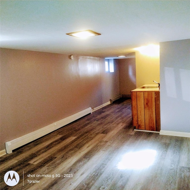 109 Lake Ave, Middletown, NY 10940 - unfurnished room featuring a baseboard radiator, dark wood-style flooring, and baseboards