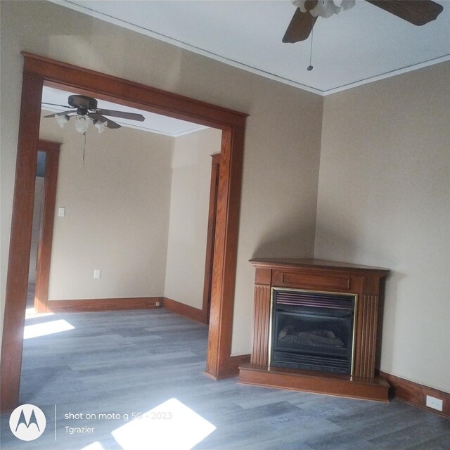 109 Lake Ave, Middletown, NY 10940 - unfurnished living room featuring a ceiling fan, wood finished floors, crown molding, baseboards, and a glass covered fireplace