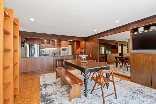 dining room with recessed lighting
