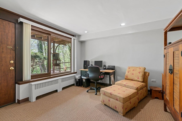 carpeted office featuring radiator and recessed lighting