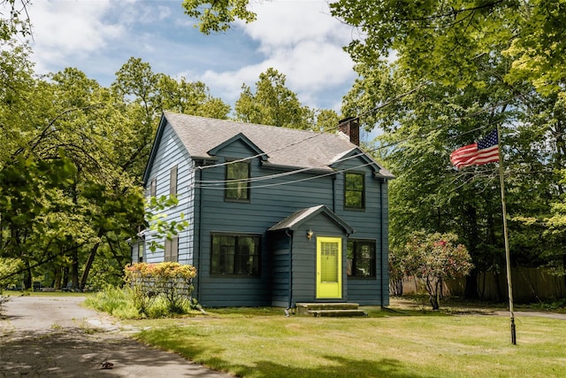 2383 State Route 97, Pond Eddy, NY 12770 - view of front of home with a chimney, roof with shingles, and driveway