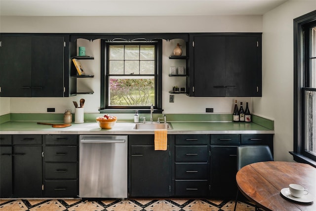 2383 State Route 97, Pond Eddy, NY 12770 - kitchen with stainless steel dishwasher, a sink, light countertops, dark cabinets, and open shelves