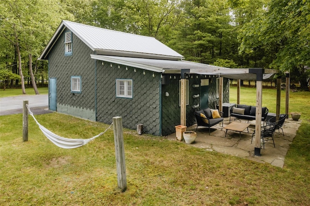 2383 State Route 97, Pond Eddy, NY 12770 - rear view of house with an outdoor hangout area, a yard, and a patio area