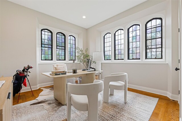 office area featuring baseboards, recessed lighting, and light wood-style floors