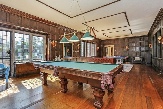 game room featuring wooden walls, dark wood-style flooring, and billiards