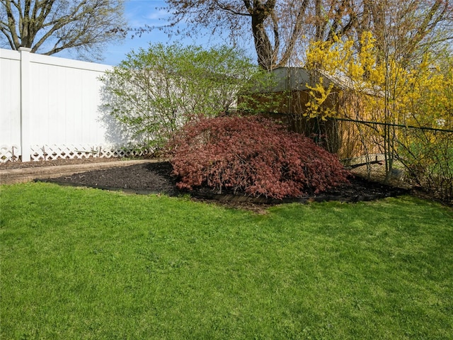 view of yard featuring fence