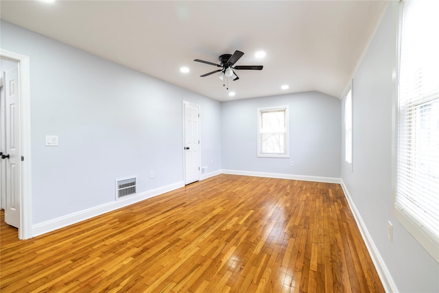 empty room with baseboards, visible vents, recessed lighting, light wood-style floors, and a ceiling fan