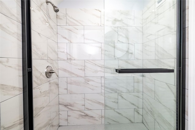 bathroom featuring a stall shower