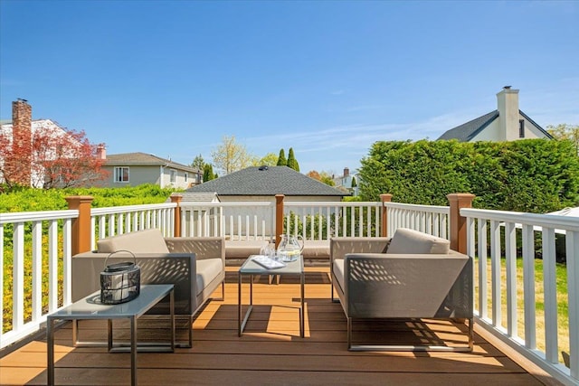 deck with an outdoor hangout area