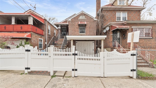 1813 Edenwald Ave, Bronx, NY 10466 - view of front of home featuring a gate, brick siding, and a fenced front yard