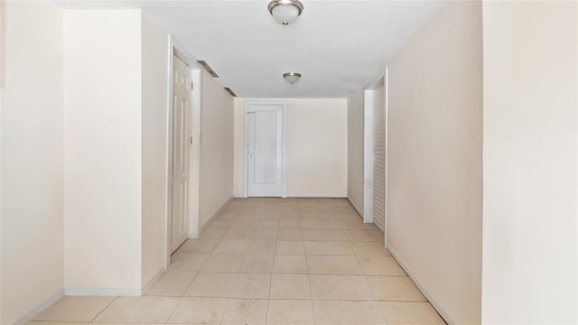 1813 Edenwald Ave, Bronx, NY 10466 - hallway featuring baseboards and light tile patterned flooring