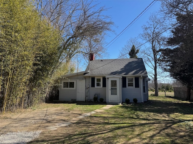 1845 Shipyard Ln, East Marion, NY 11939 - view of front of home featuring a chimney and a shingled roof