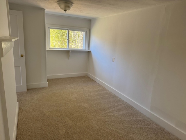 1845 Shipyard Ln, East Marion, NY 11939 - unfurnished room featuring light colored carpet and baseboards