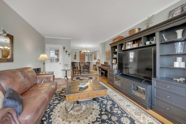 1255 N Ave Unit B-4L, New Rochelle, NY 10804 - living room featuring crown molding, wood finished floors, and a notable chandelier