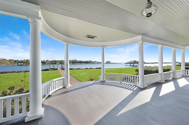 127 Senix Ave, Center Moriches, NY 11934 - view of patio / terrace with a water view
