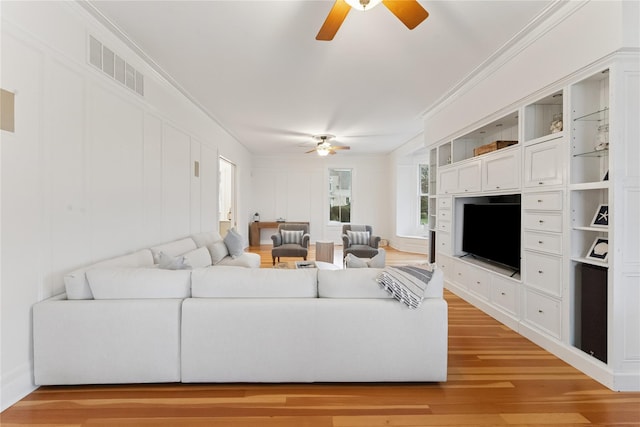 127 Senix Ave, Center Moriches, NY 11934 - living area featuring visible vents, a ceiling fan, and light wood-type flooring