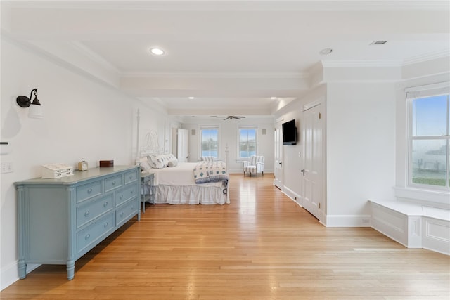 127 Senix Ave, Center Moriches, NY 11934 - bedroom with crown molding, multiple windows, and light wood finished floors