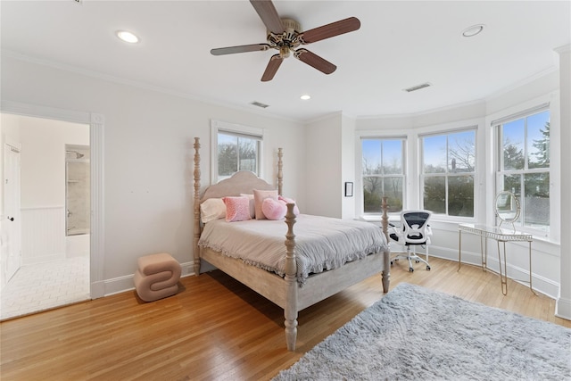 127 Senix Ave, Center Moriches, NY 11934 - bedroom with crown molding, light wood-style flooring, and visible vents