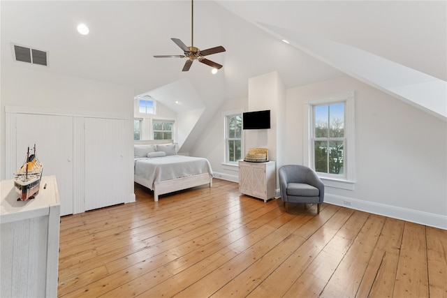 127 Senix Ave, Center Moriches, NY 11934 - bedroom featuring ceiling fan, visible vents, baseboards, light wood-type flooring, and vaulted ceiling