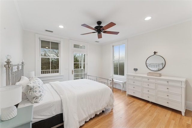 127 Senix Ave, Center Moriches, NY 11934 - bedroom featuring visible vents, ornamental molding, access to outside, recessed lighting, and light wood-style flooring