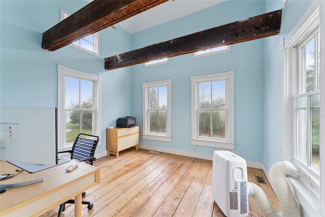 127 Senix Ave, Center Moriches, NY 11934 - office space with a healthy amount of sunlight, baseboards, light wood finished floors, and beam ceiling