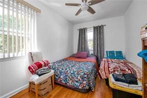 1103 Rhinelander Ave, Bronx, NY 10461 - bedroom with wood finished floors and ceiling fan