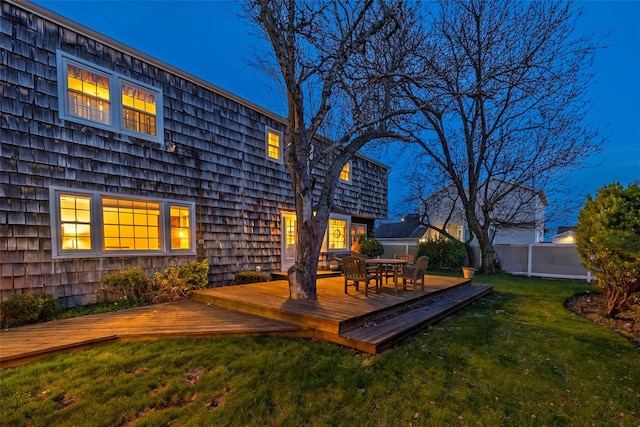 deck with fence and a yard
