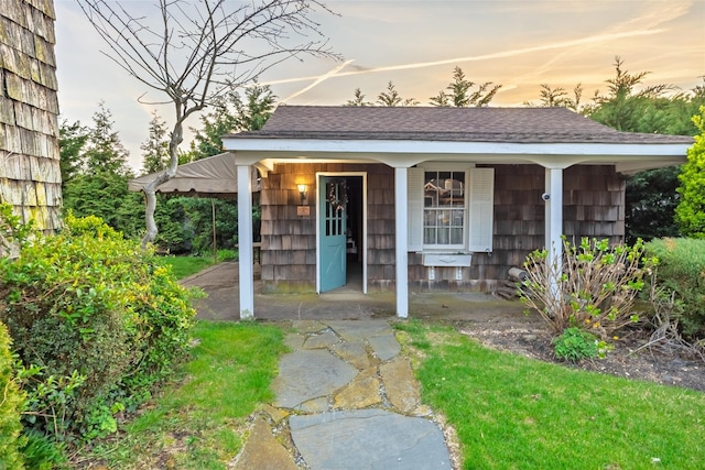 view of outbuilding with a porch