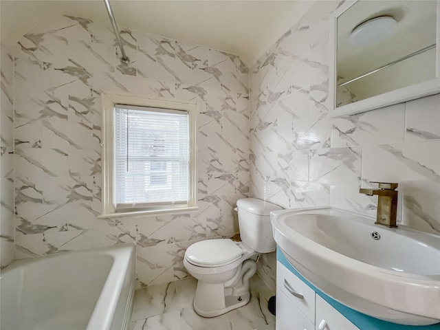 32-12 208th St, Bayside, NY 11361 - bathroom featuring marble finish floor, a washtub, vanity, toilet, and tile walls