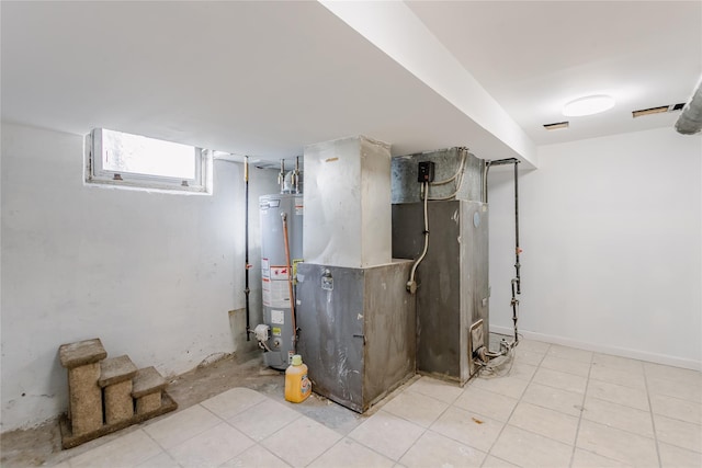 32-12 208th St, Bayside, NY 11361 - below grade area featuring water heater, tile patterned flooring, and heating unit