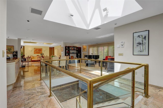 dining room with visible vents and a skylight