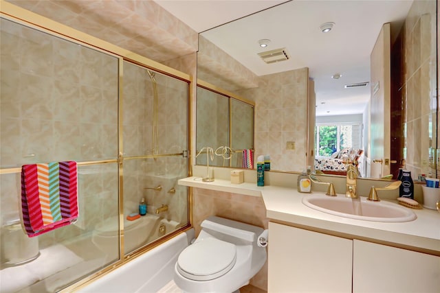 bathroom with recessed lighting, vanity, toilet, visible vents, and enclosed tub / shower combo