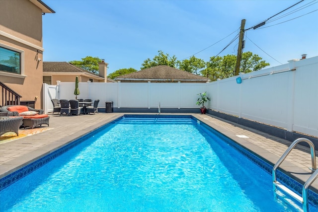 158-40 81st St, Howard Beach, NY 11414 - view of pool featuring a fenced backyard, a patio area, and an outdoor hangout area