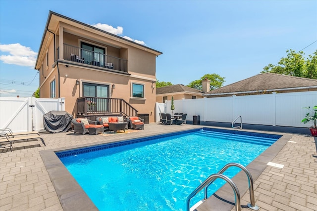 158-40 81st St, Howard Beach, NY 11414 - view of swimming pool with a fenced backyard, a patio area, an outdoor living space, and a gate