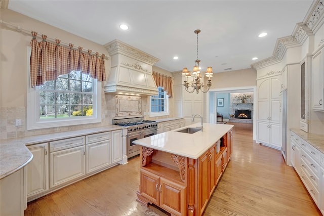 85 Woodlands Rd, Harrison, NY 10528 - kitchen with double oven range, a sink, a chandelier, tasteful backsplash, and open shelves