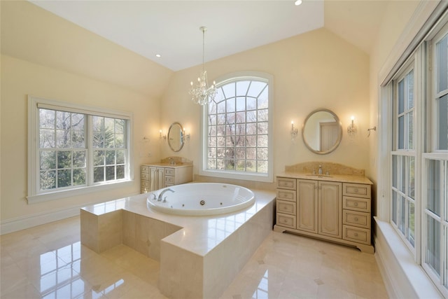 85 Woodlands Rd, Harrison, NY 10528 - bathroom with lofted ceiling, a chandelier, tile patterned floors, two vanities, and a whirlpool tub