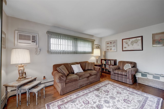 living room with a baseboard heating unit and wood finished floors
