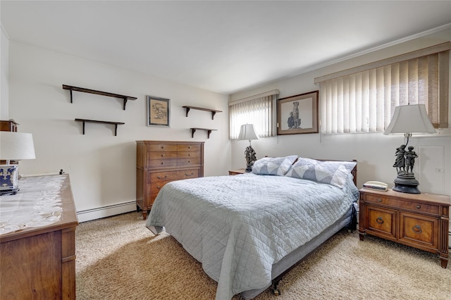bedroom featuring baseboard heating and light colored carpet