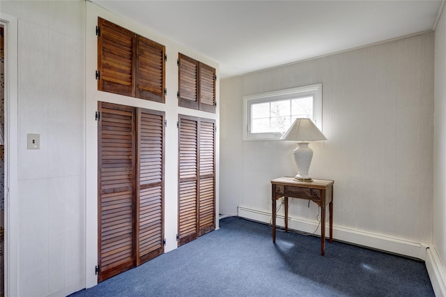 home office with a baseboard radiator and carpet flooring