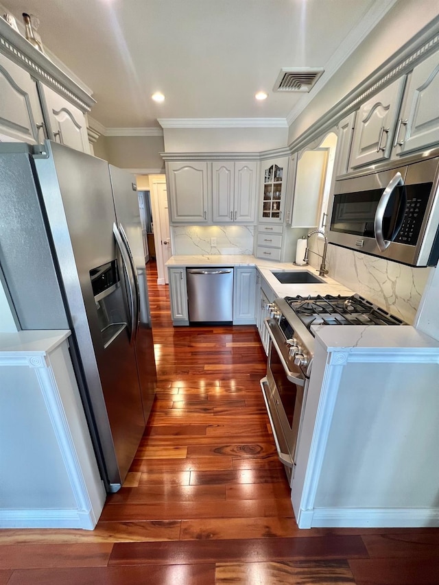 1258 Mace Ave, Bronx, NY 10469 - kitchen featuring dark wood finished floors, appliances with stainless steel finishes, a sink, and visible vents